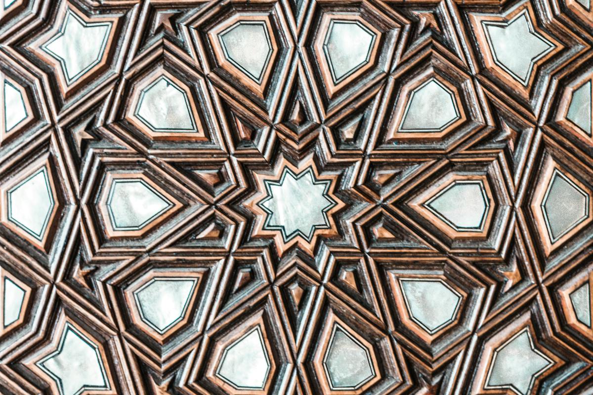 Carved wooden geometric star pattern