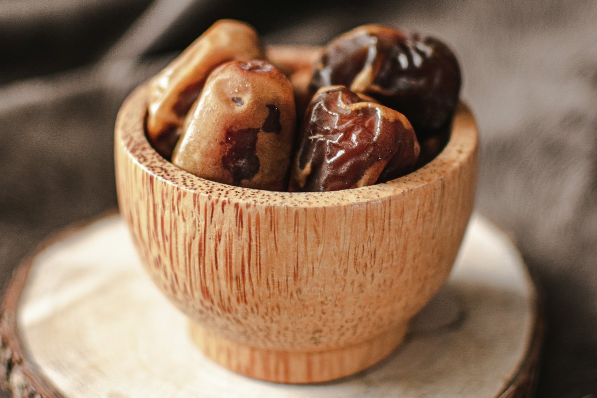 Dates in a wooden bowl
