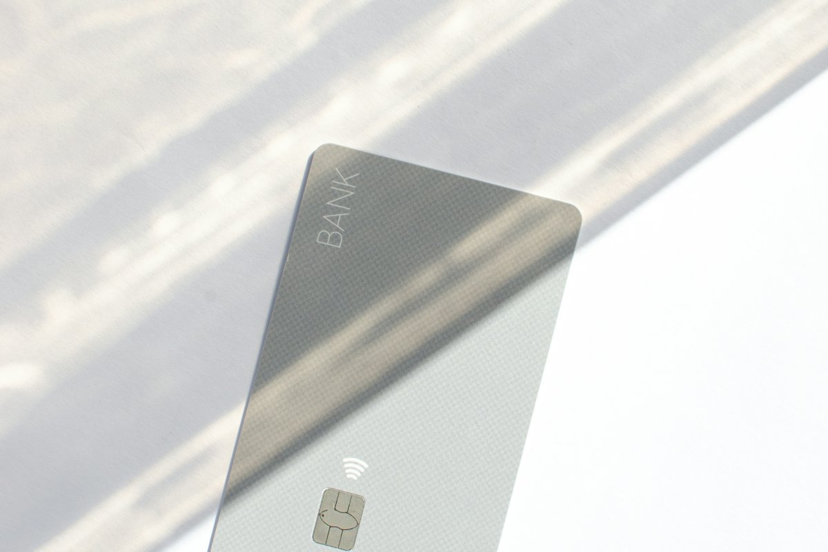 Silver card resting in soft window light
