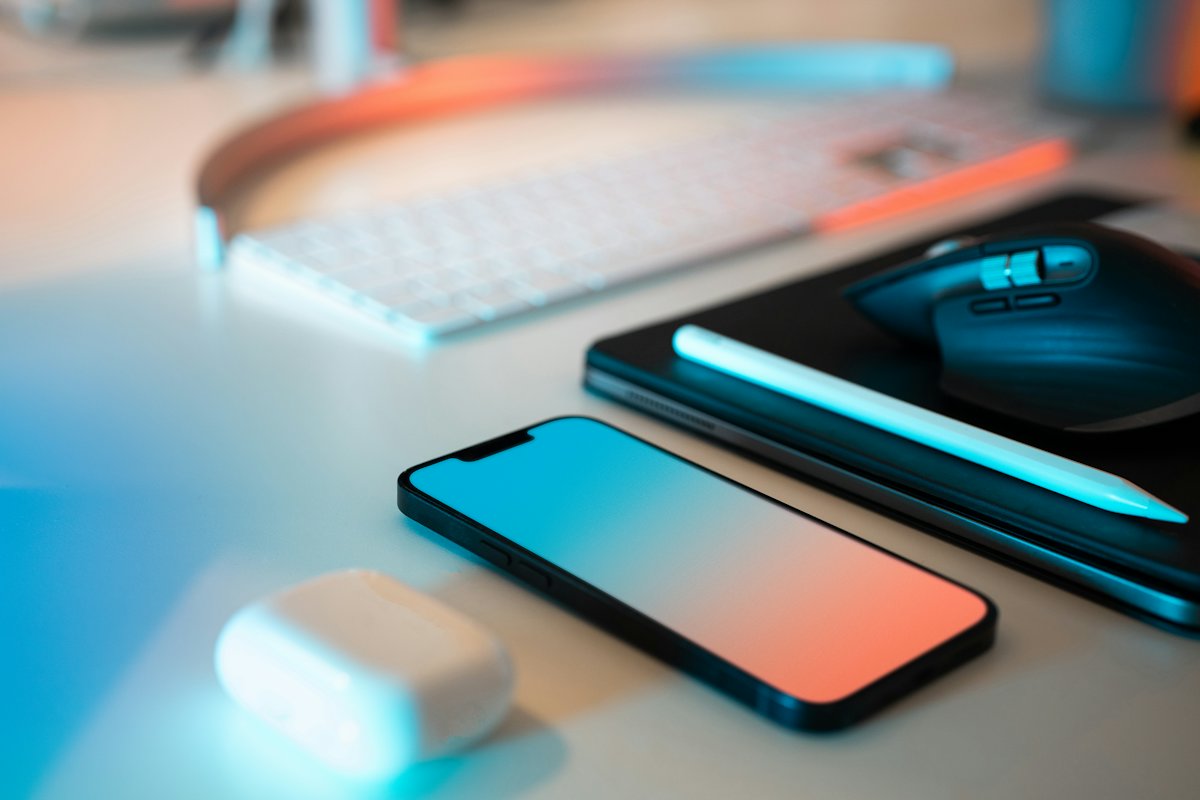 Smartphone with a blank screen next to a keyboard