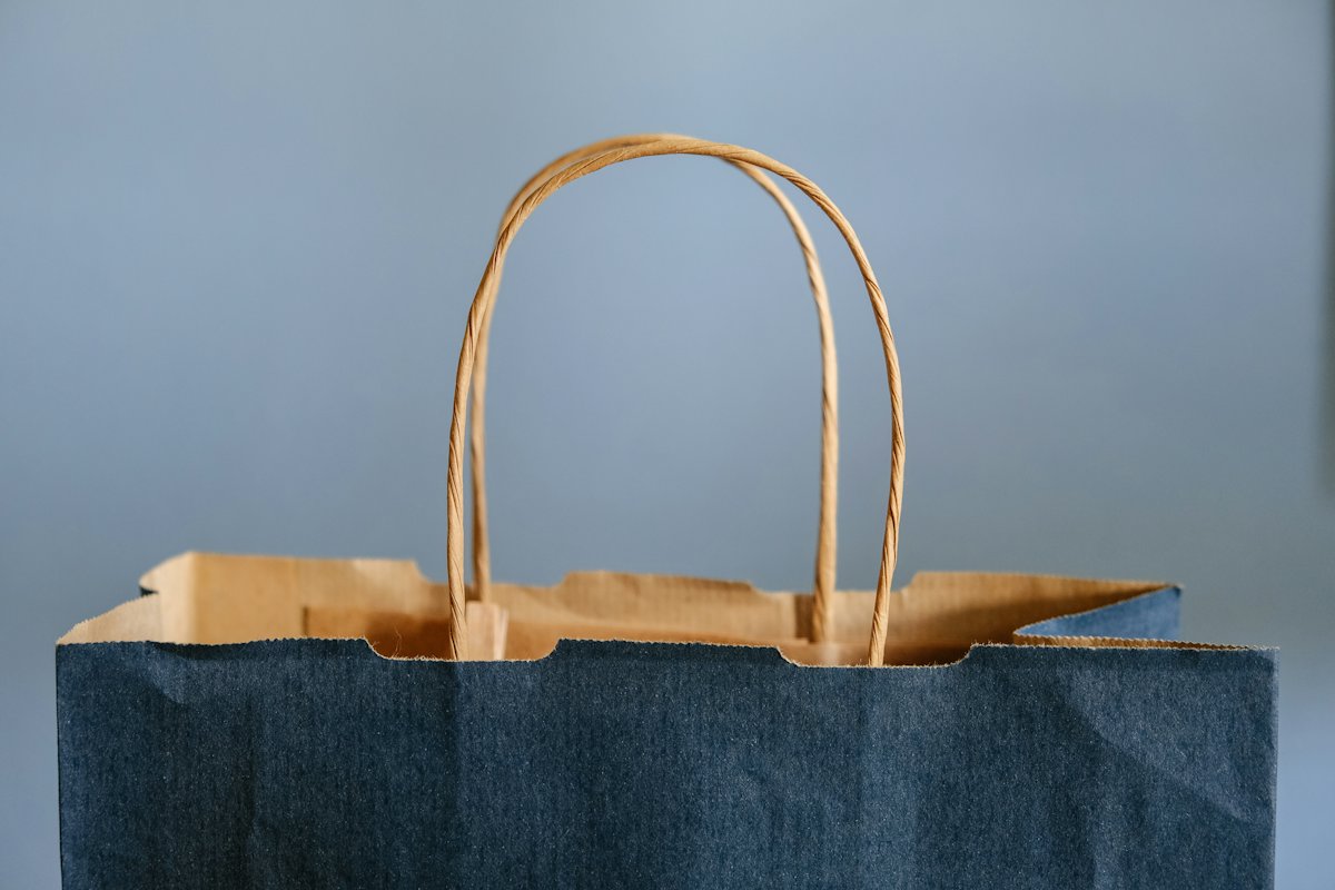 Navy paper shopping bag with rope handles