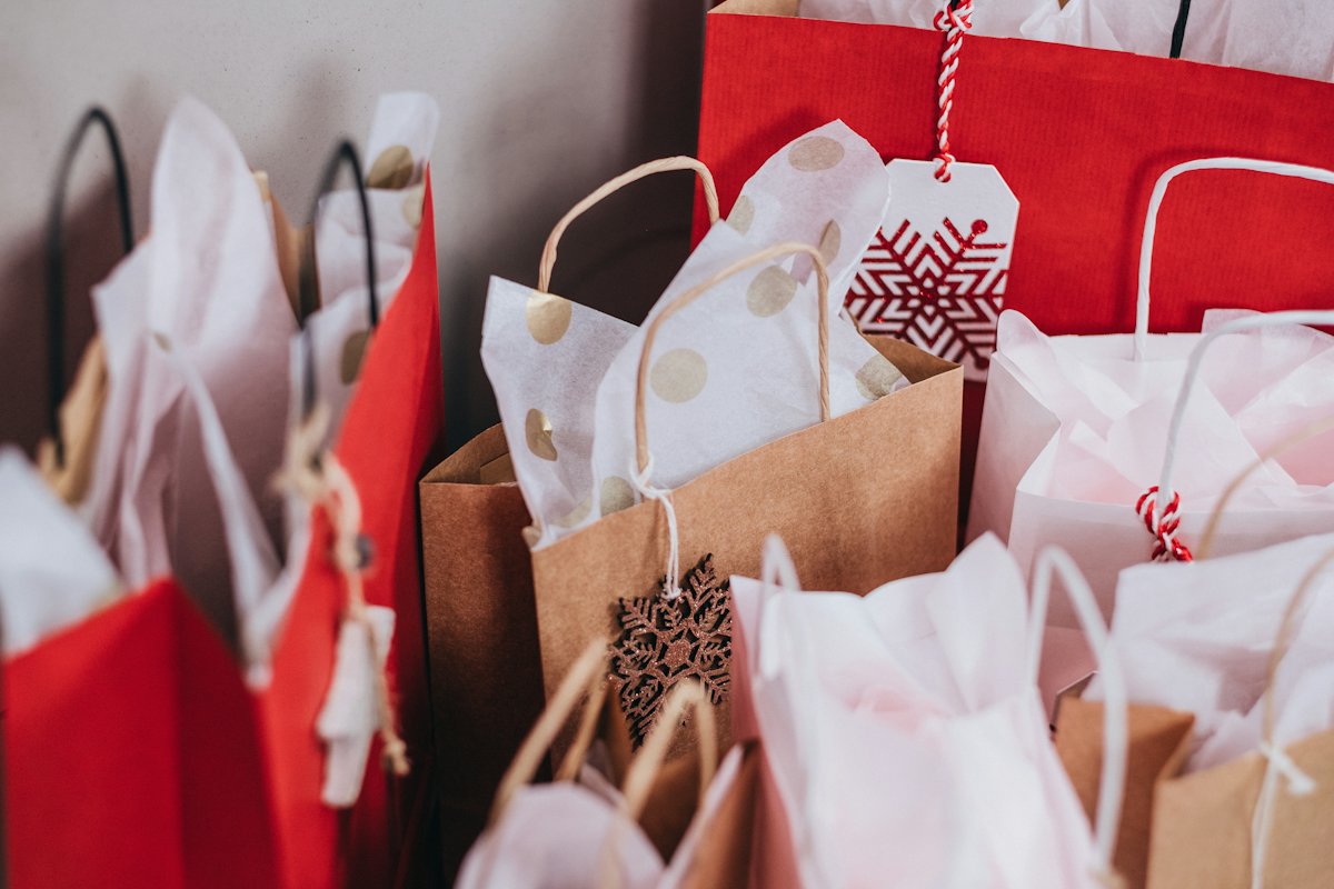 Colourful shopping bags with tissue paper