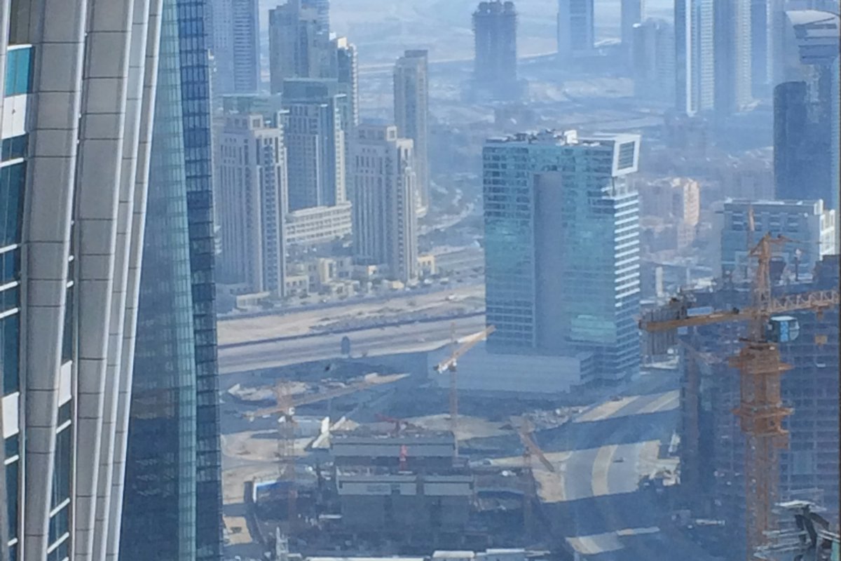 Glass towers seen from a high floor